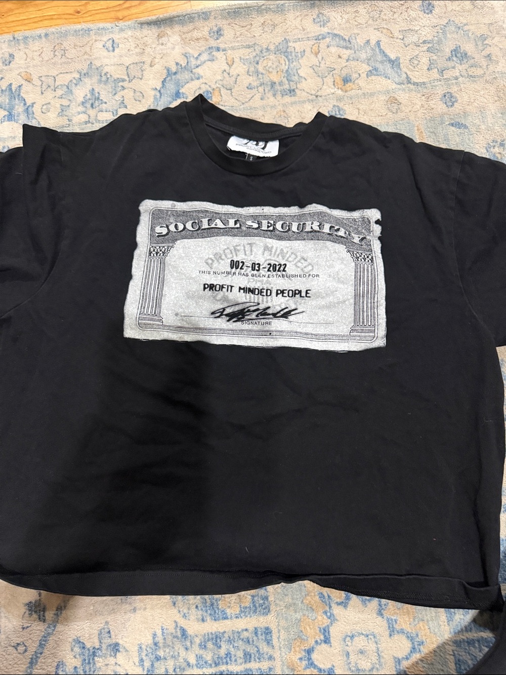 Black Short-Sleeve Graphic Tee with Social Security Motif